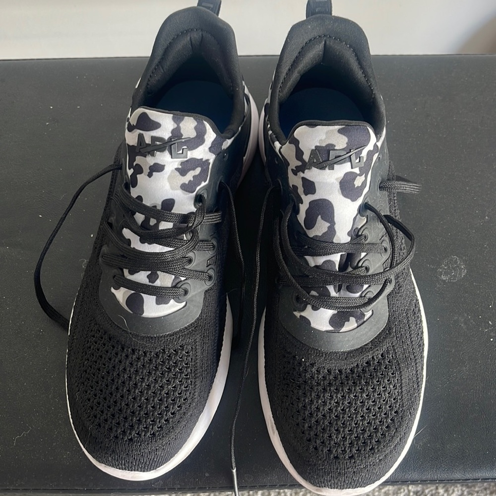 APl tie up tennis shoes.